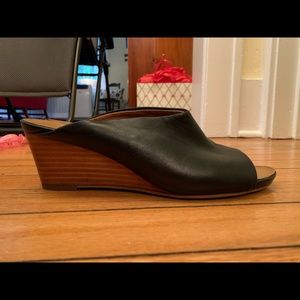 Lightly worn Franco Sarto black and brown wooden wedge mules, Size 8